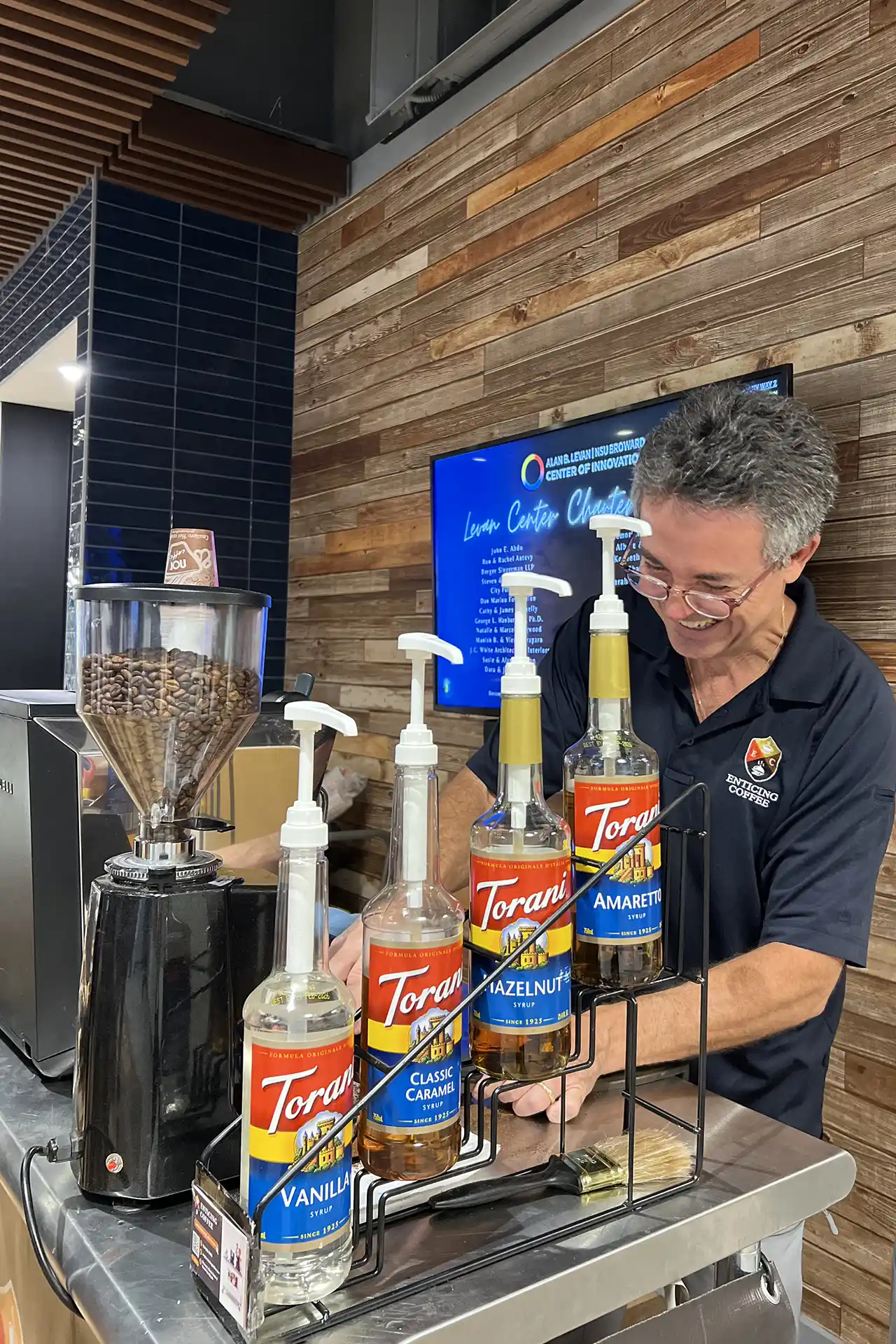 Barista making fresh espresso at a corporate event coffee cart in Miami